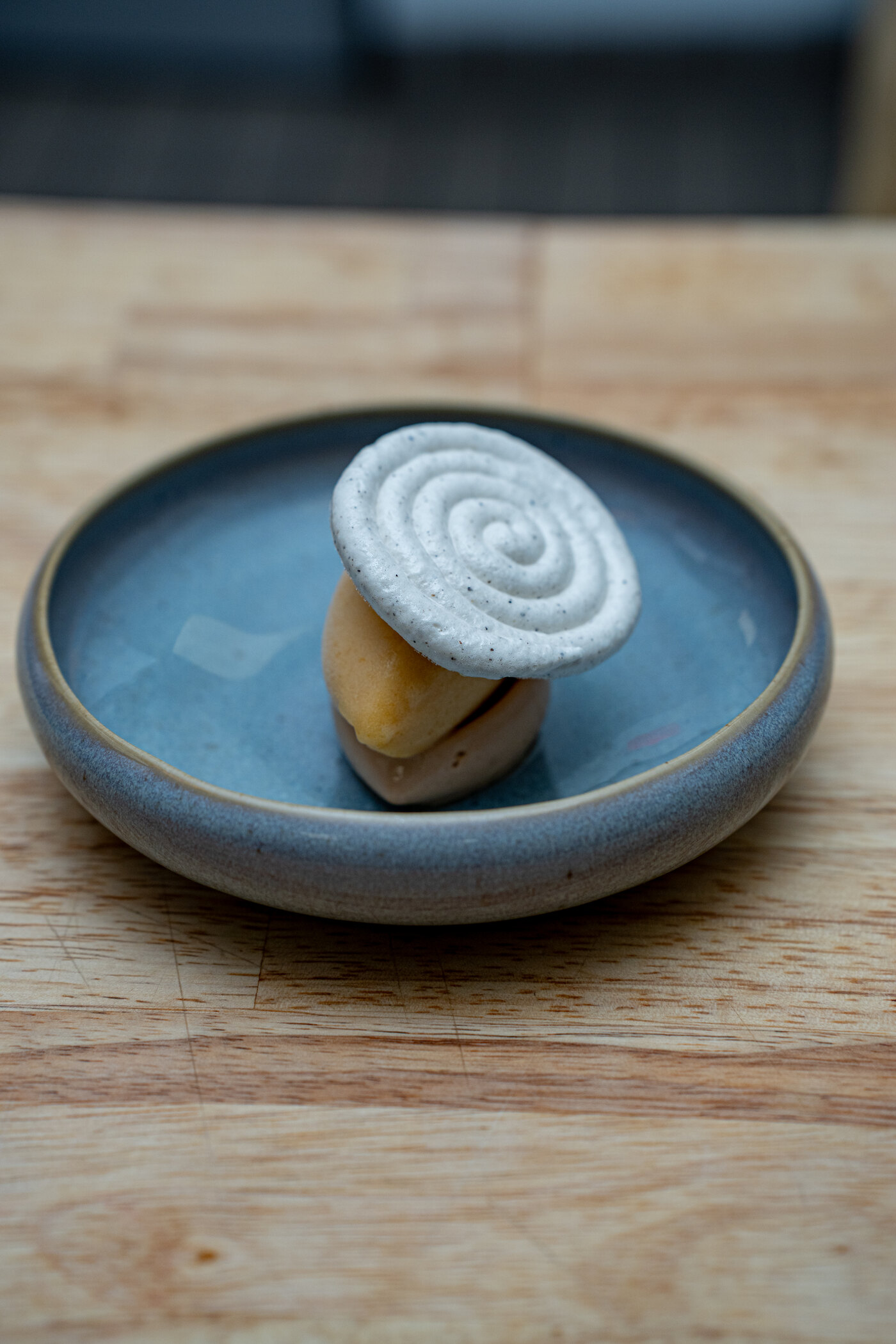 Small dessert course in a ceramic bowl